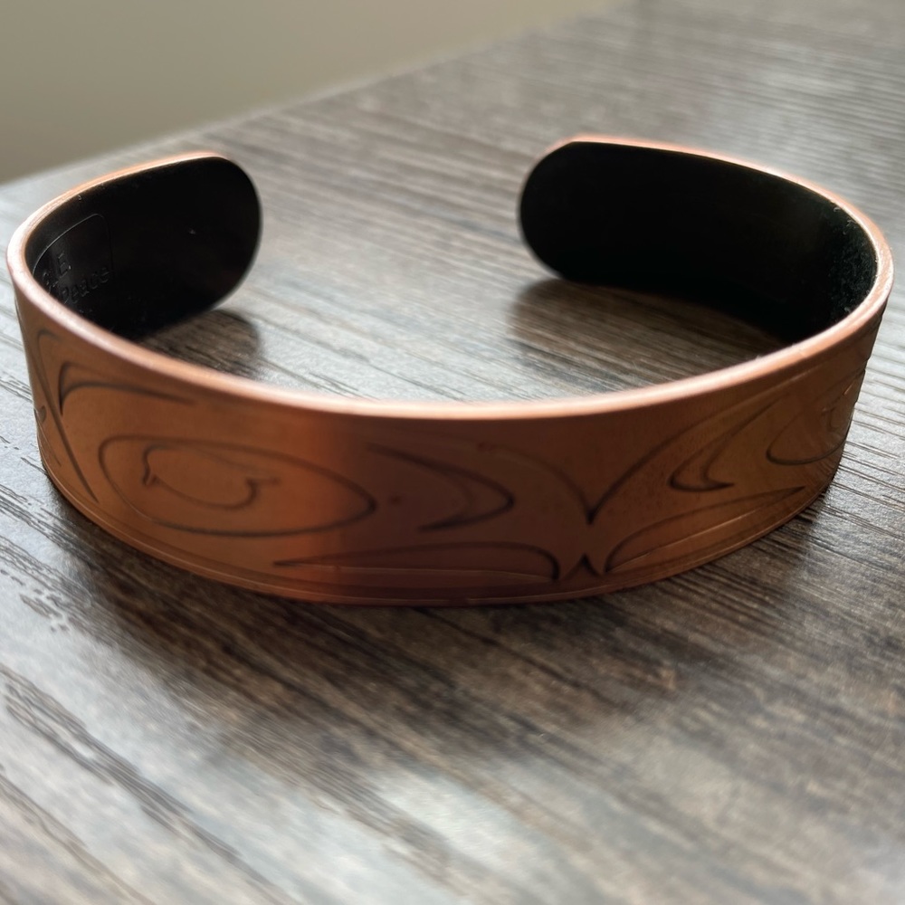 Gitxsan artist Yunks Orca Eagle symbol of peace & friendship cuff